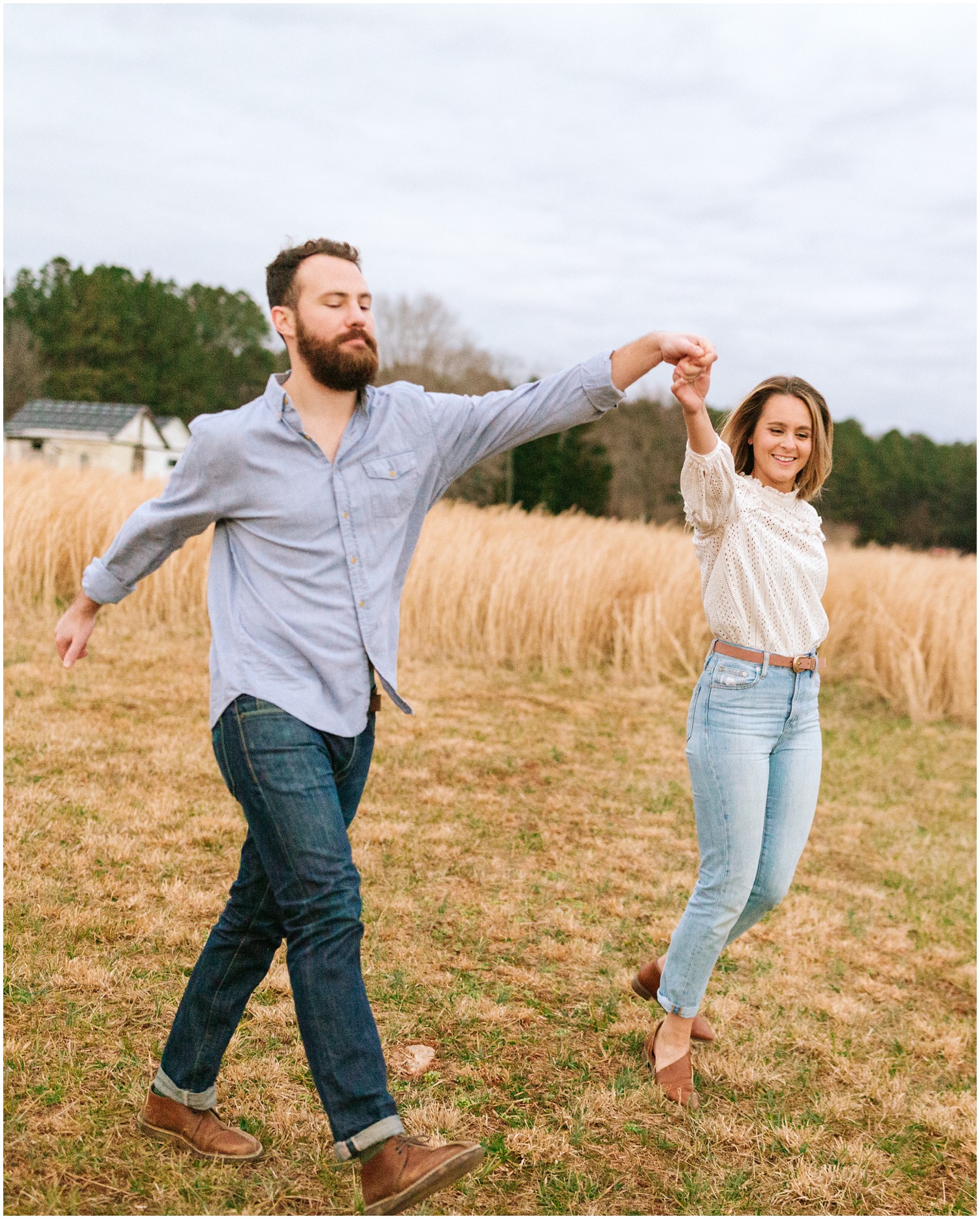 Chelsea Renay photographs couple walking through field