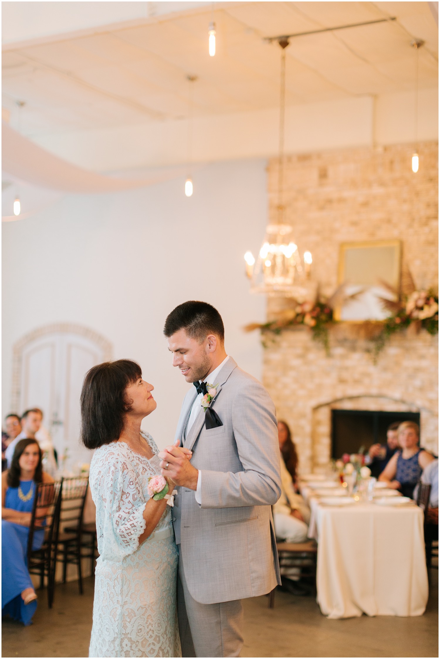 groom dances with mother during Wrightsville Manor wedding reception