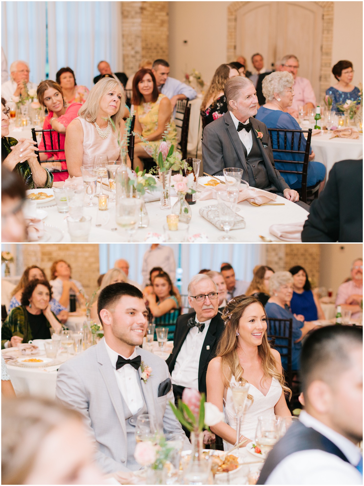 guests listen to toast during reception with bride and groom