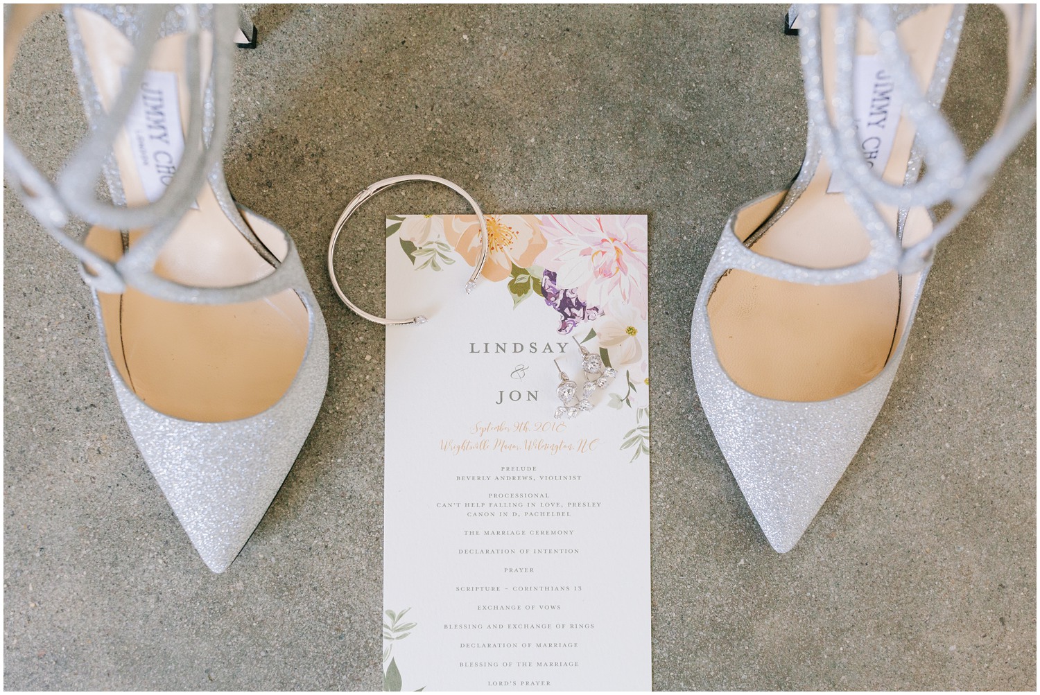 bride's silver shoes with invitation for Wrightsville Manor wedding 