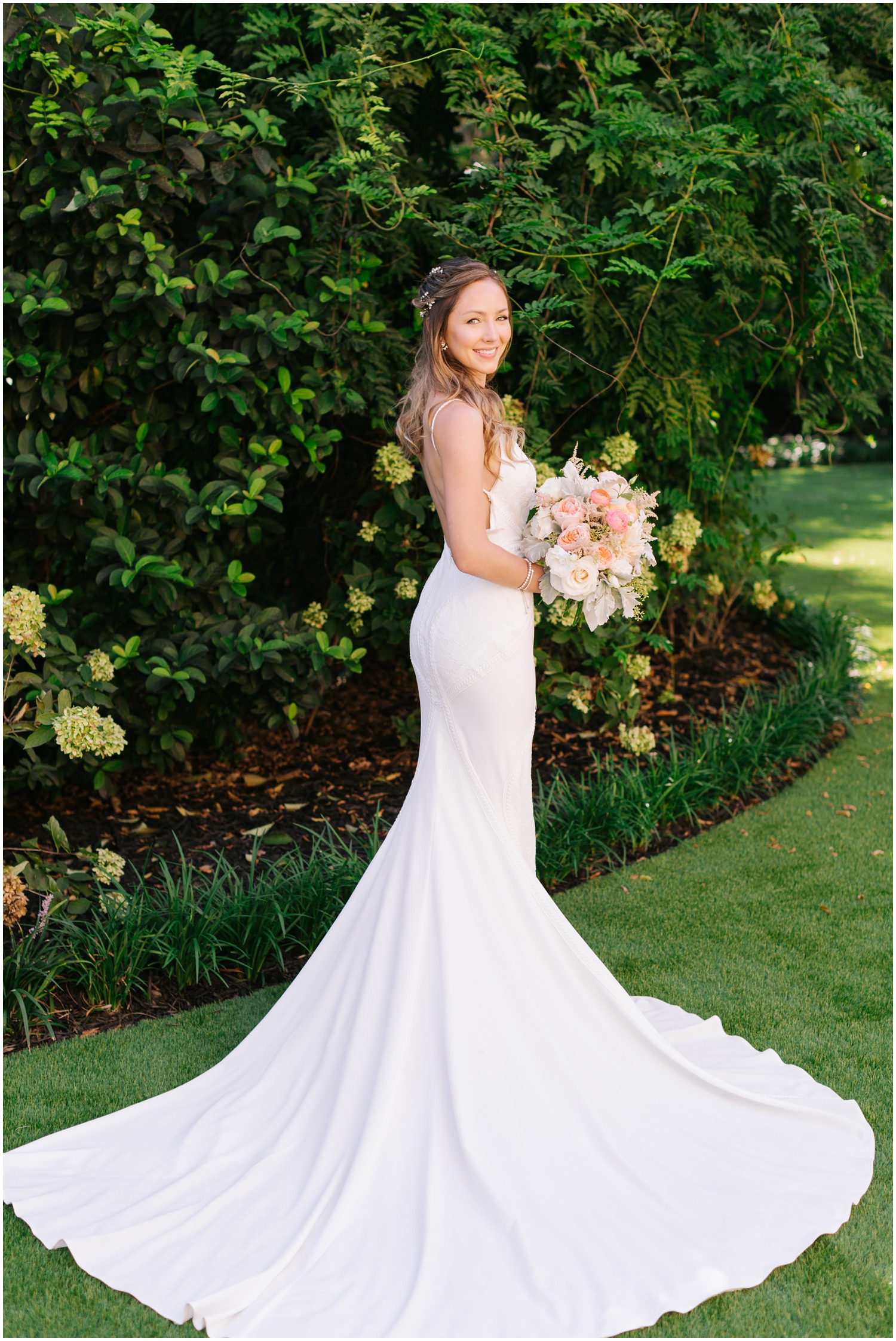 classic bridal portrait of bride with train spread around her