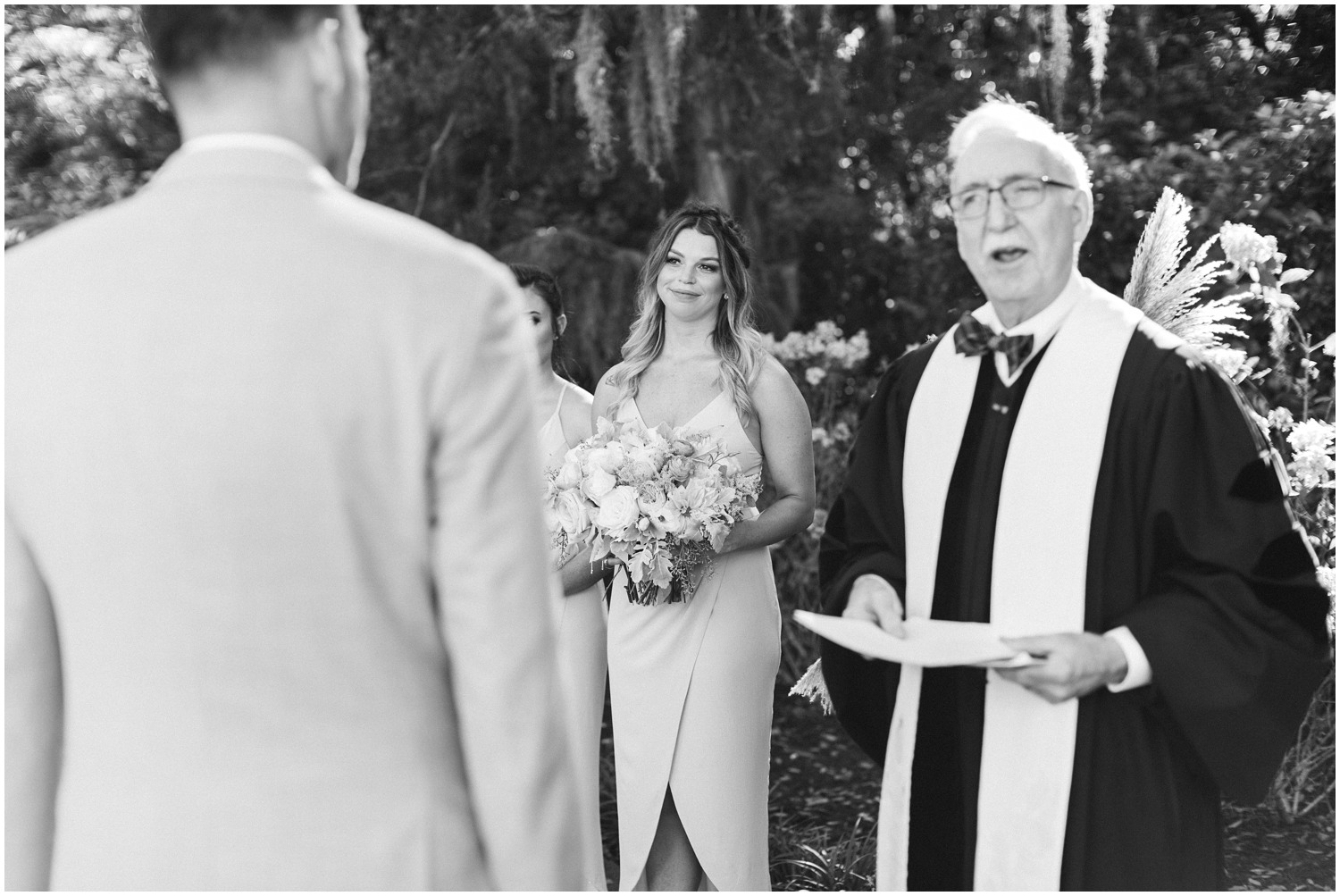 groom gives vows during wedding reception