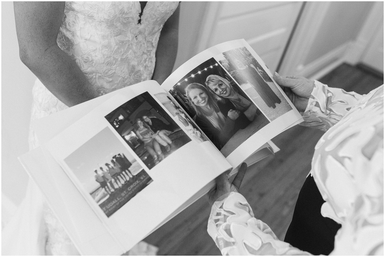 bride shares book with mom on wedding day