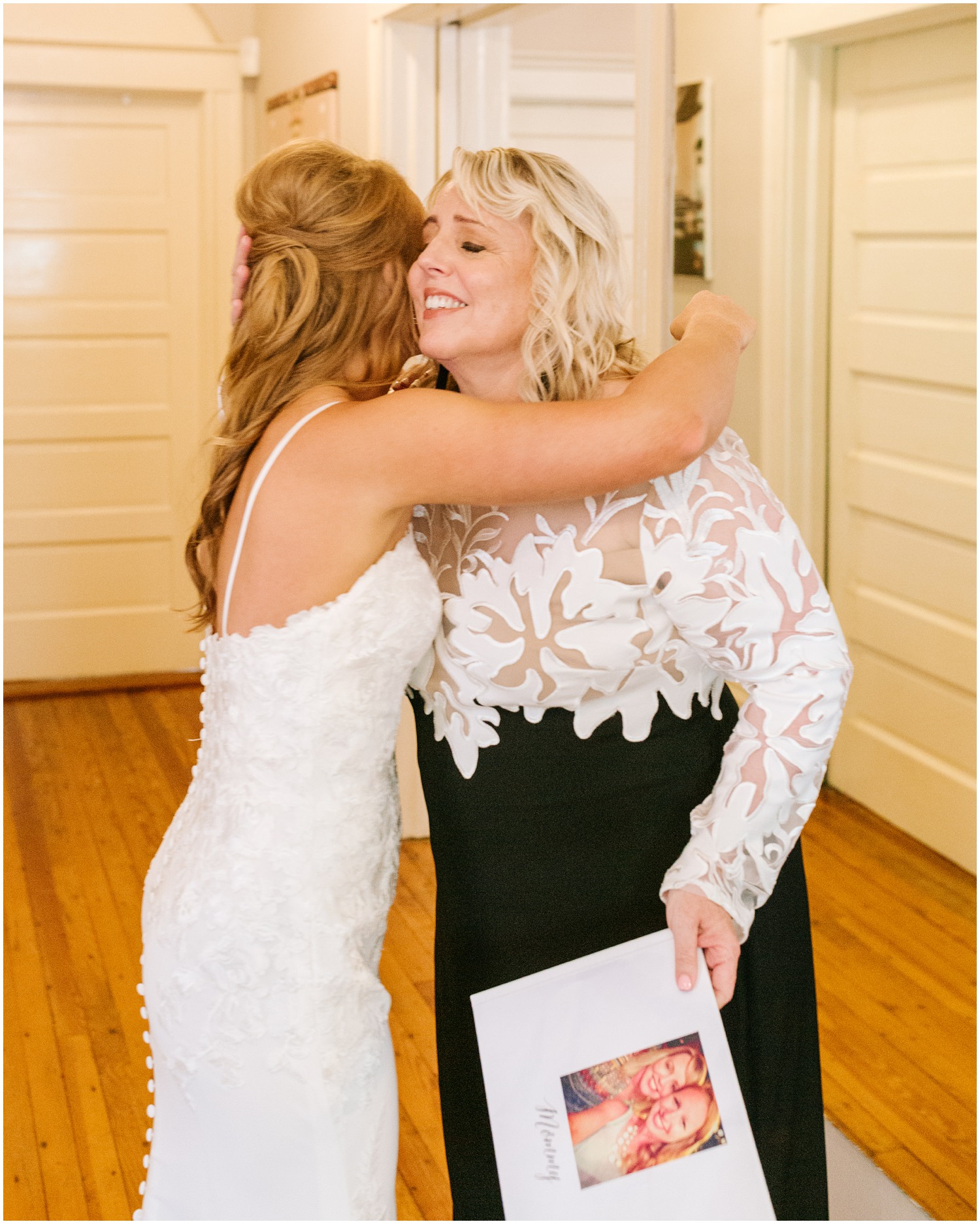 bride gives mom gift on morning of wedding