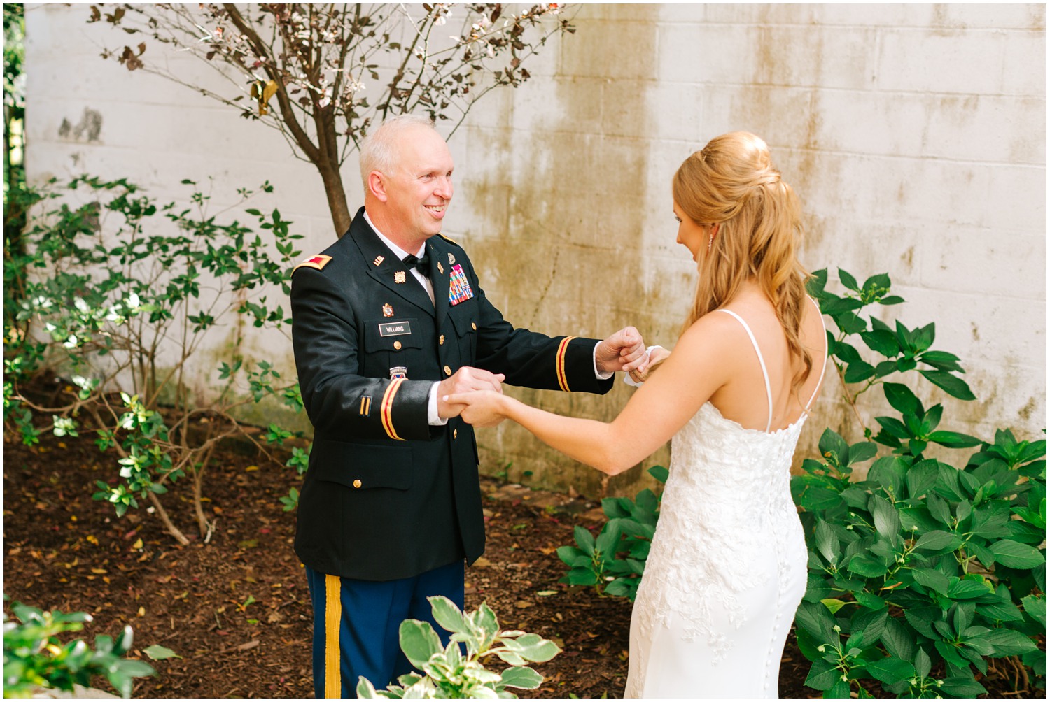 bride has first look with dad before Brooklyn Arts Center wedding