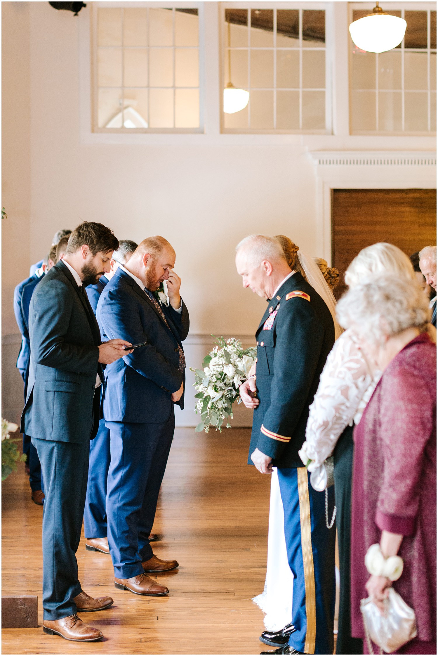 moment of prayer before wedding ceremony in Brooklyn Arts Center