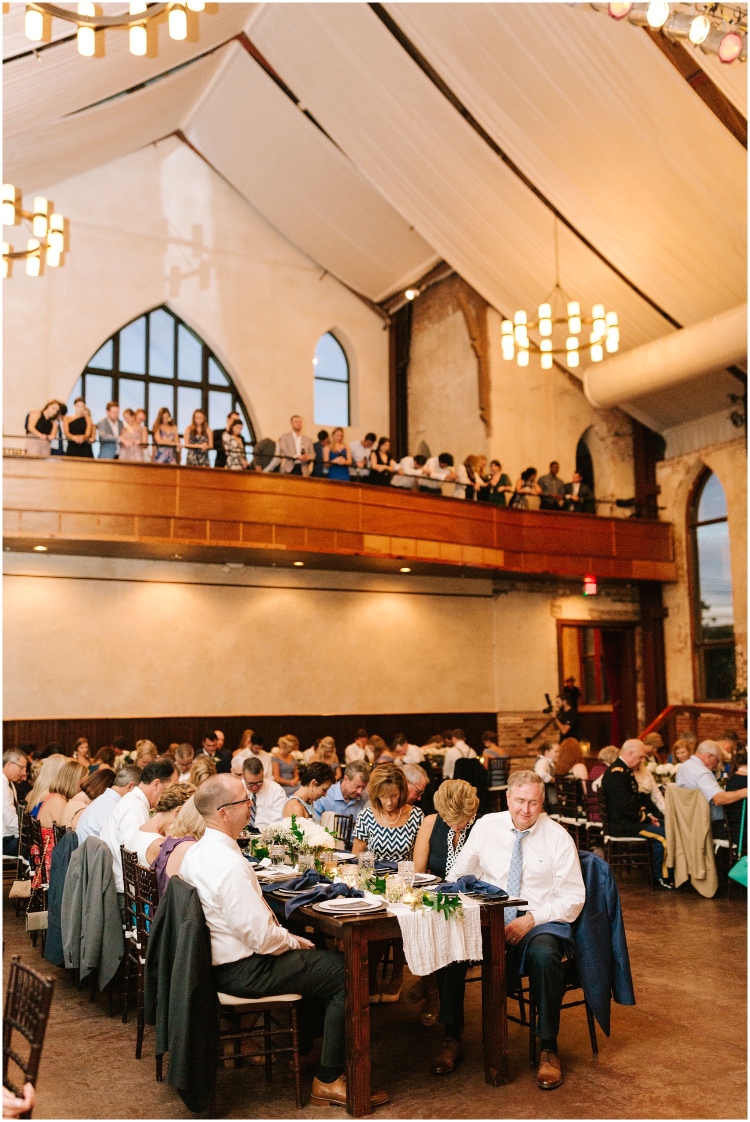 moment of prayer during Wilmington NC wedding reception