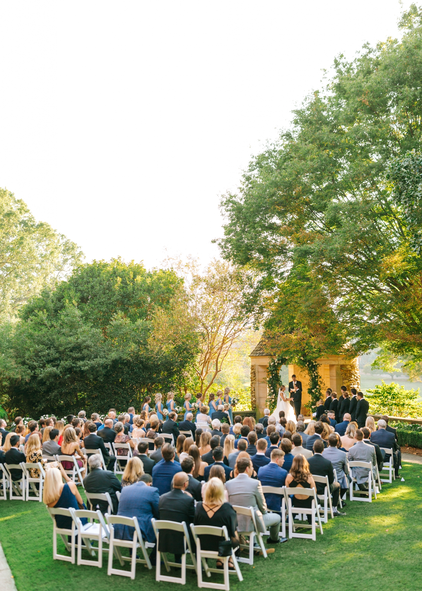 Winston Salem Wedding Photographer documents a wedding ceremony on the lawn at The Graylyn Estate in Winston-Salem