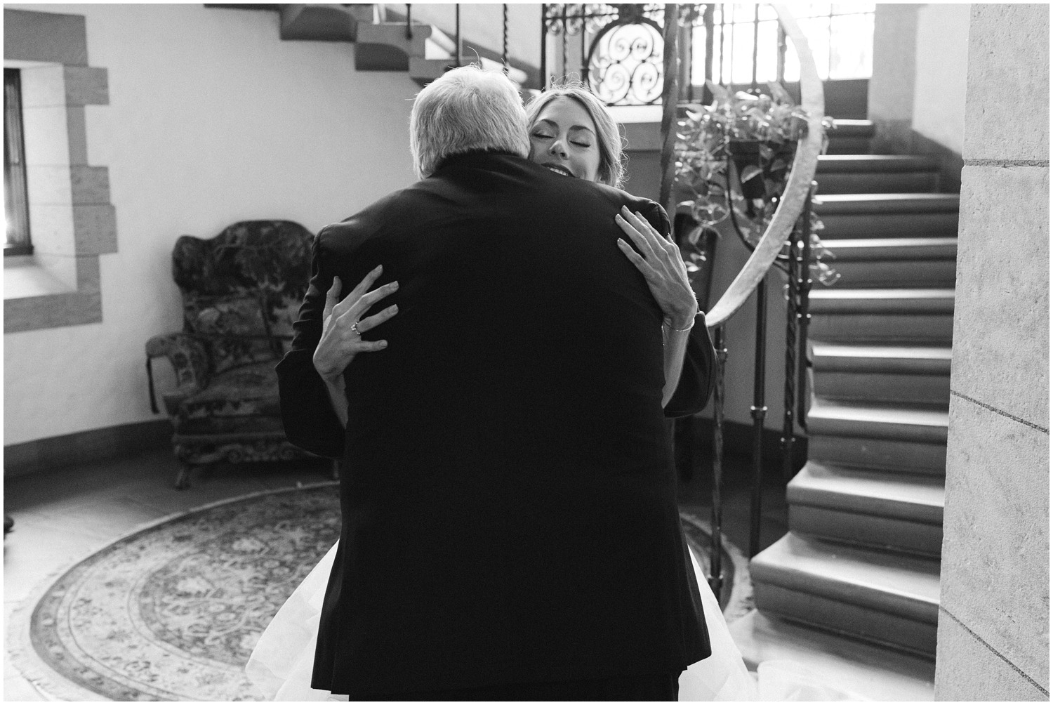 bride and father hug during first look at Graylyn Estate
