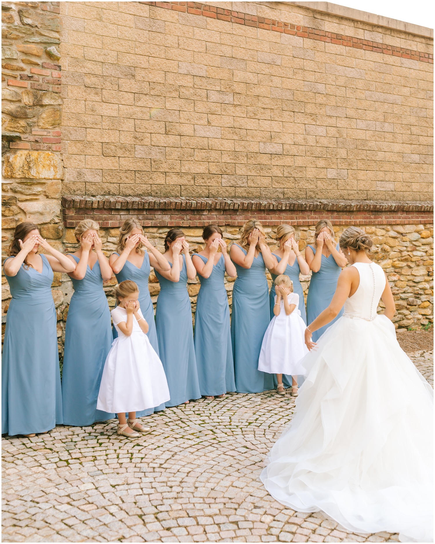 bridesmaids cover eyes before seeing bride for the first time photographed by Chelsea Renay Photography