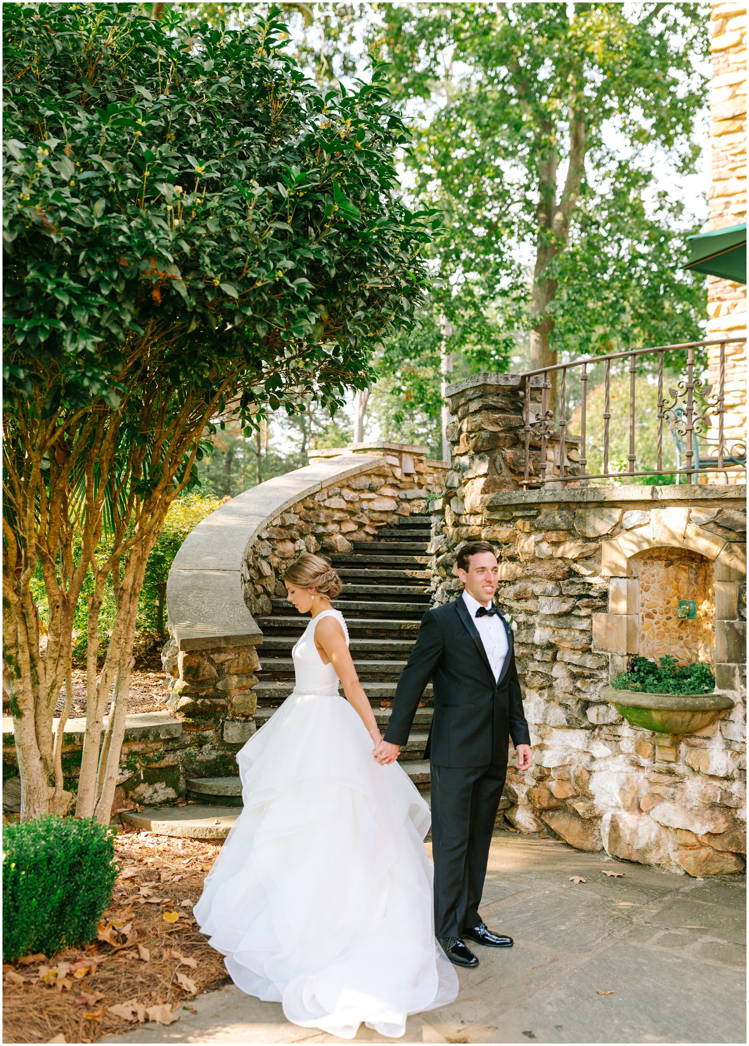 bride and groom's first touch at Graylyn Estate