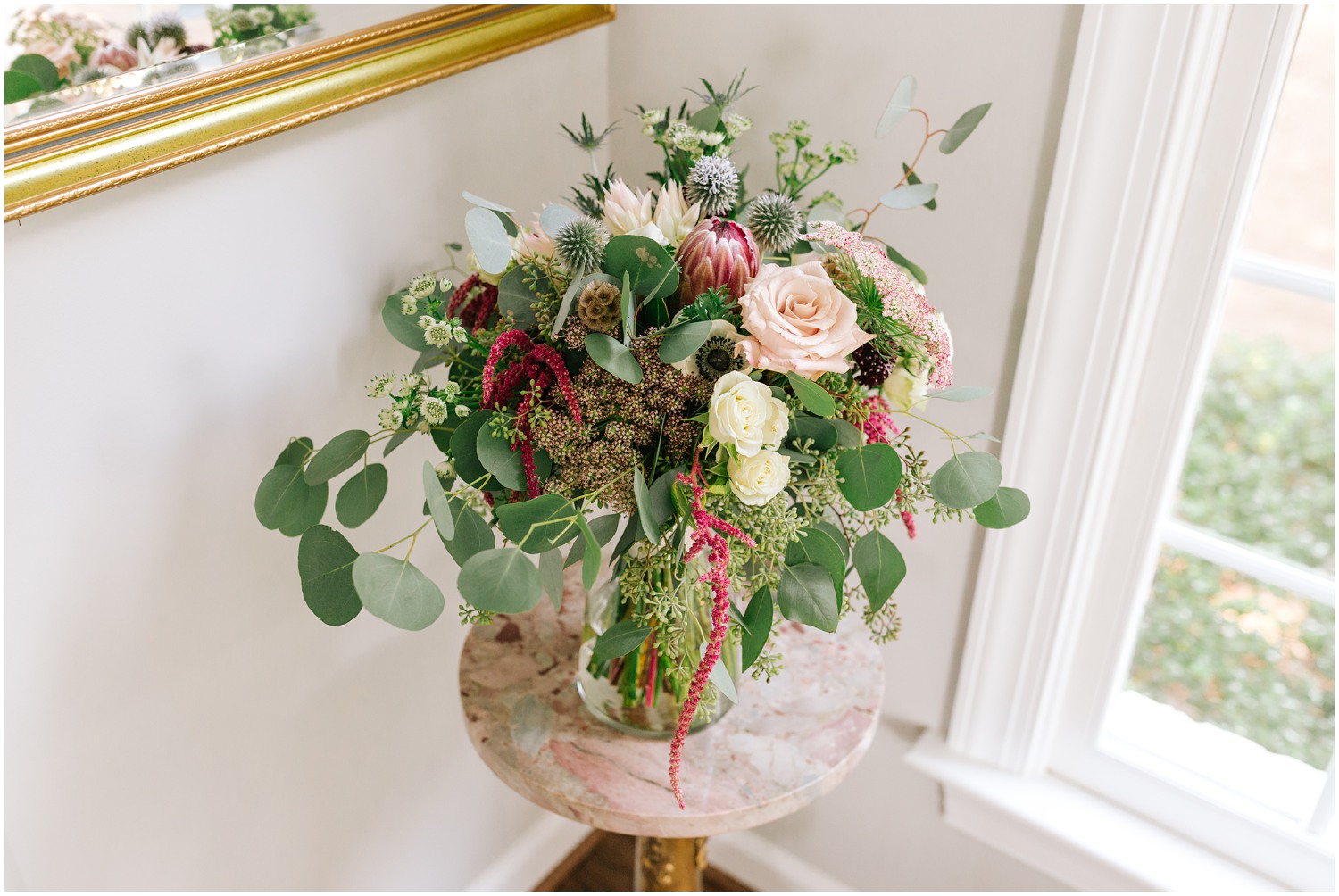 bride's bouquet with succulents and eucalyptus leaves