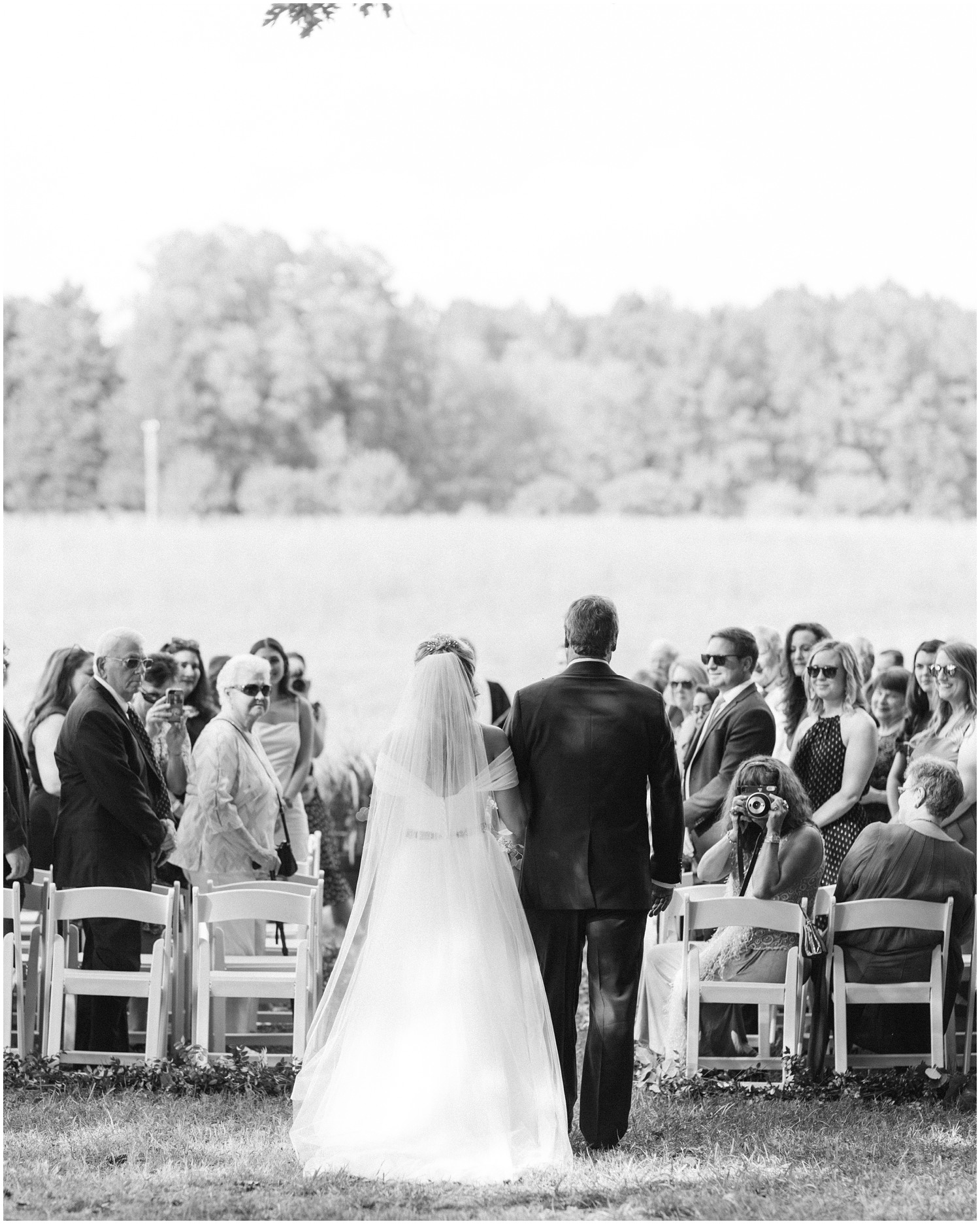 father walks bride down the aisle at The Meadows Raleigh
