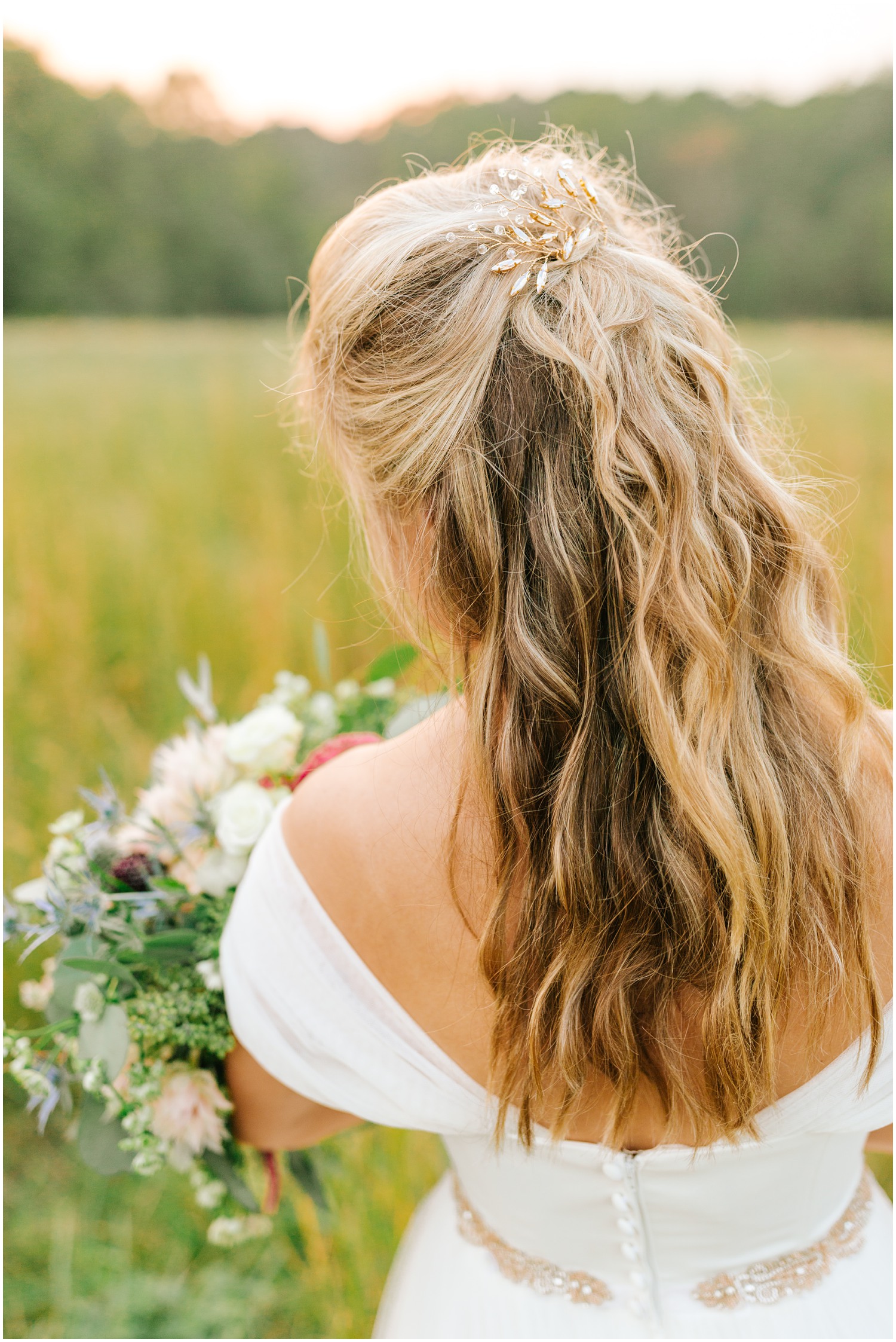 Chelsea Renay photographs bridal portraits in field at sunset