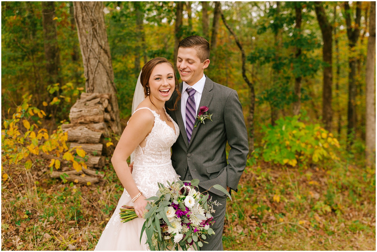 groom looks at bride laughing during NC wedding photos