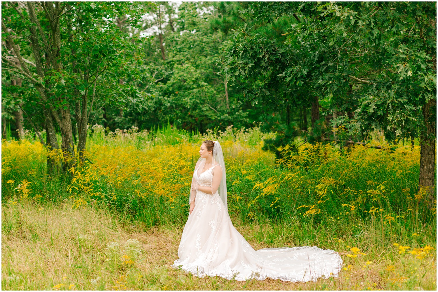 bride holds arm with one hand 