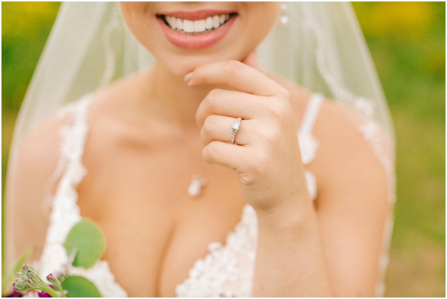 bride shows off wedding ring during bridal session