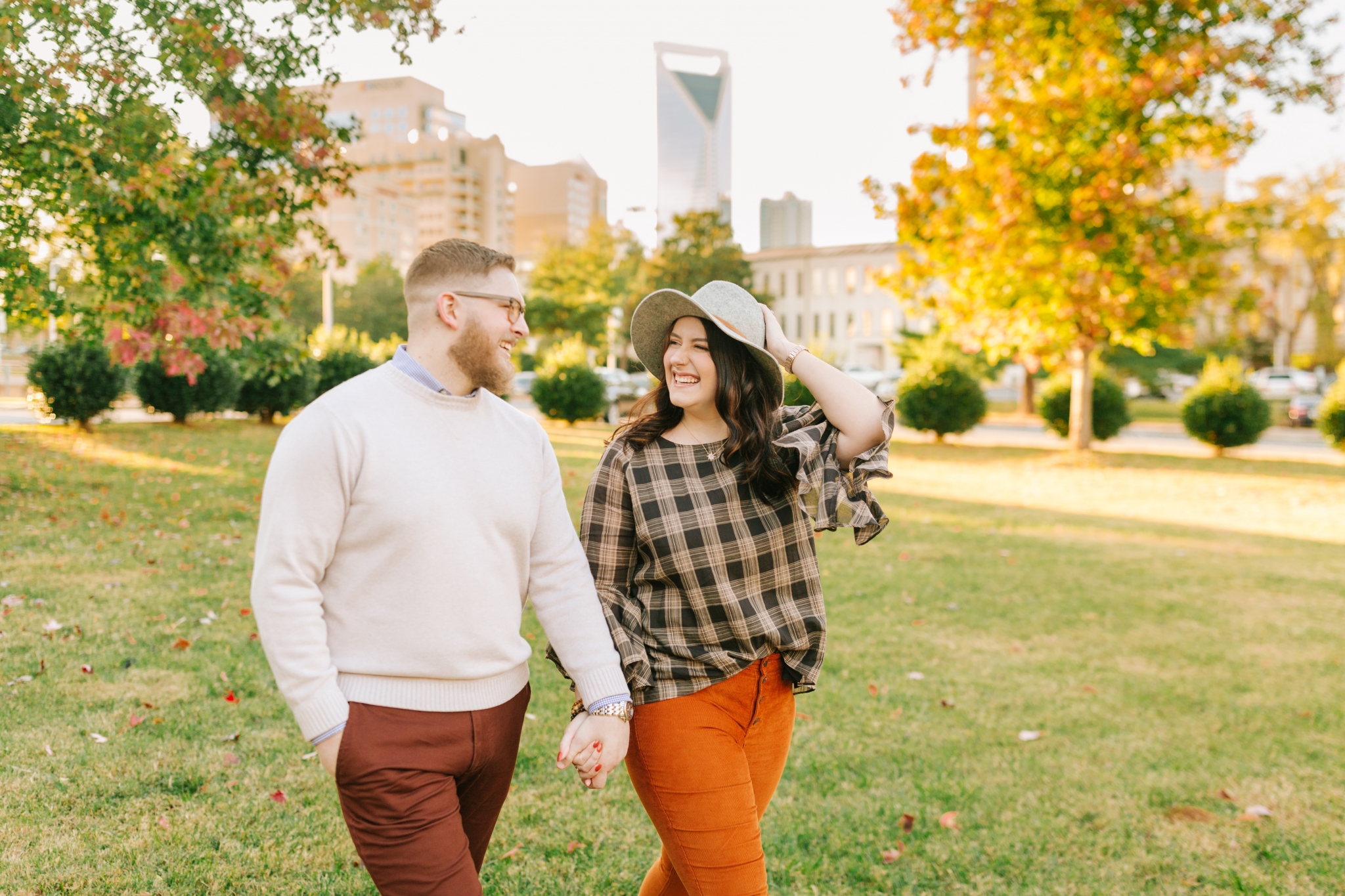 Winston-Salem Wedding Photographer captures engagement photos of a couple in Charlotte North Carolina at Marshall Park Uptown