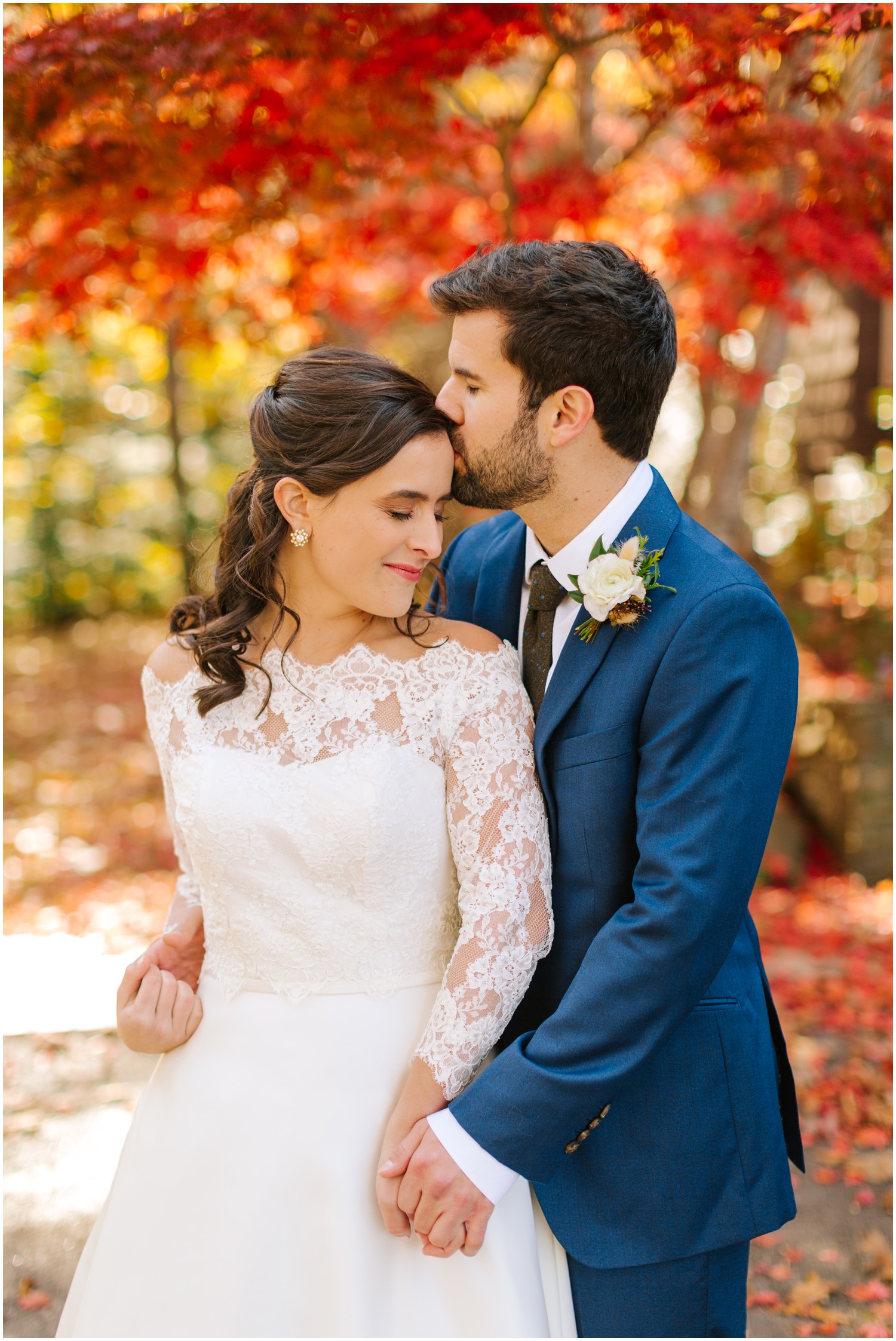 Asheville wedding portraits in fall leaves by Chelsea Renay