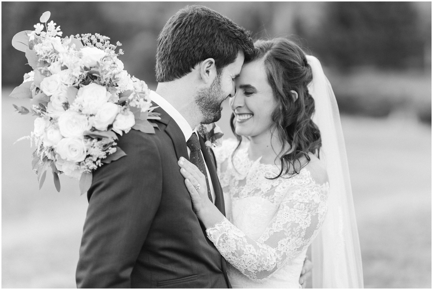 bride hugs groom after Black Mountain NC wedding day