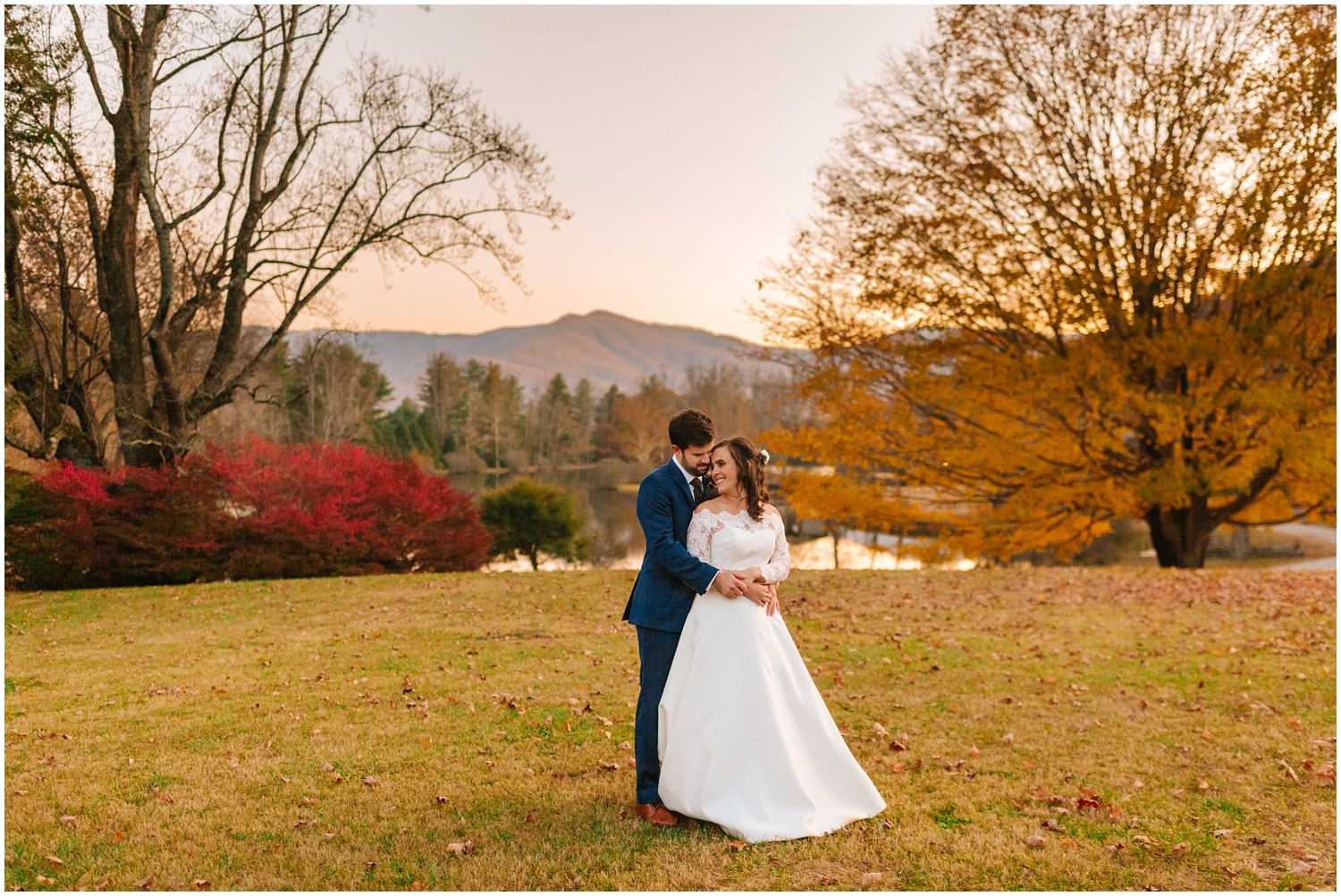 sunset wedding portraits in front of Lake Eden in Black Mountain NC