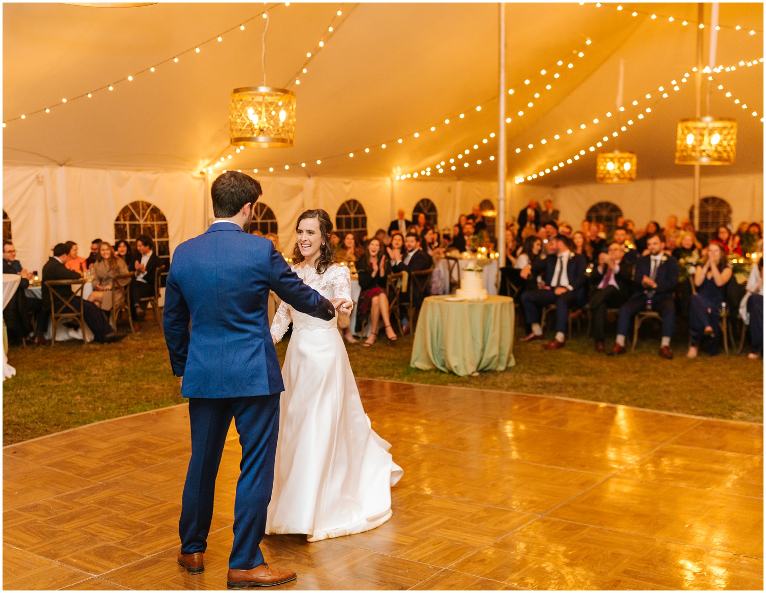 groom dances with new wife under tent at Lake Eden Events