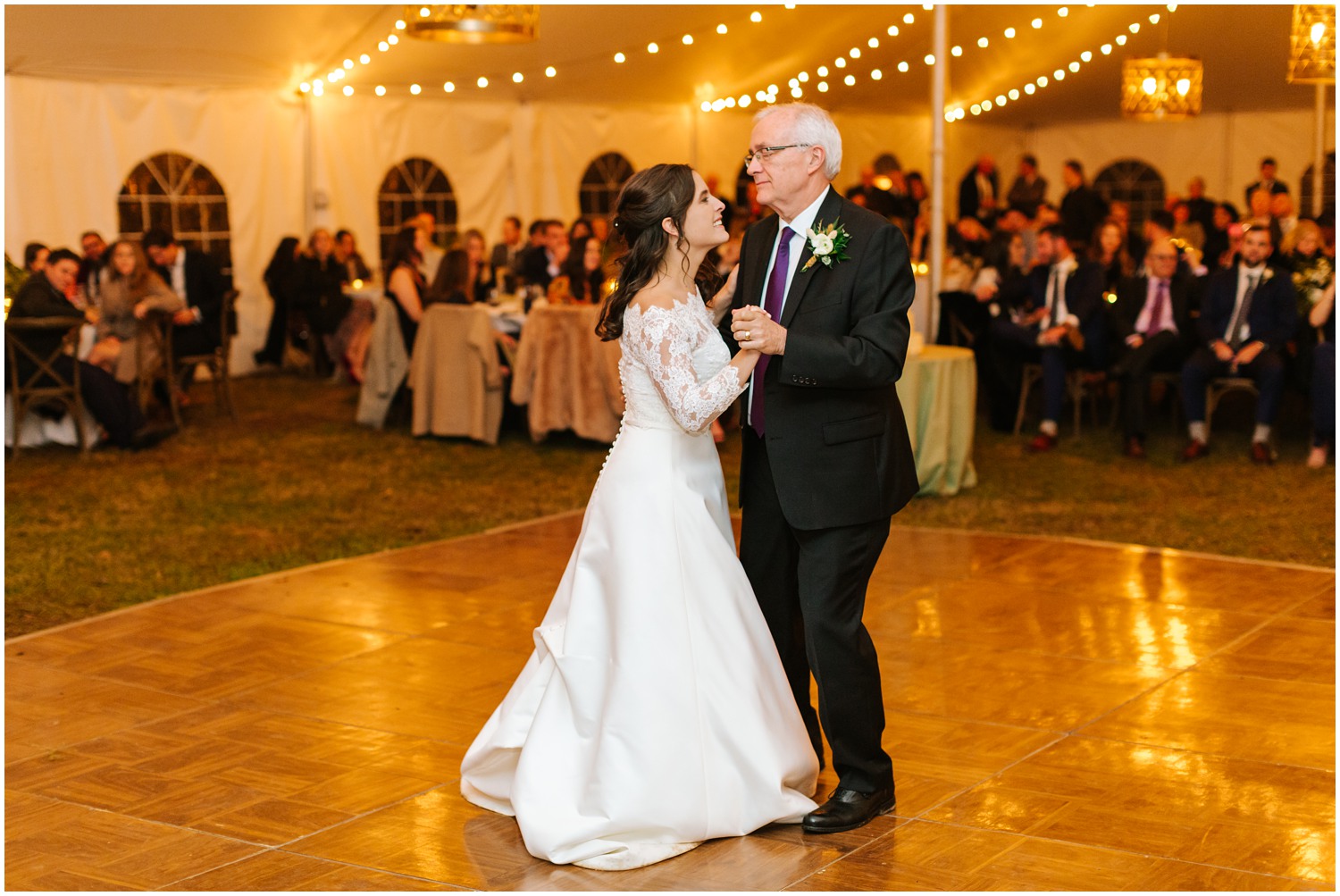 bride dances with father during wedding at Lake Eden Events