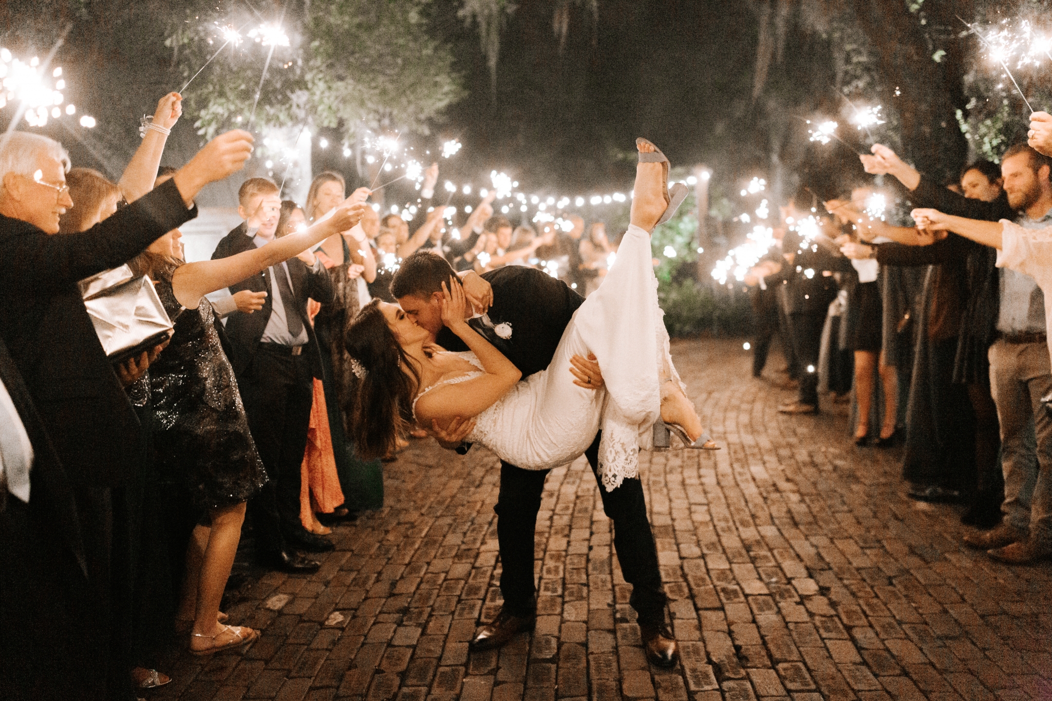 Destination Wedding Photographer Chelsea Renay captures sparkler exit photos for a couple on their wedding day.