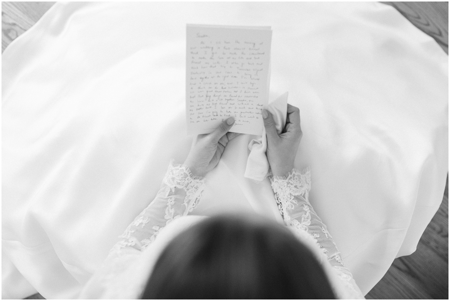 Chelsea Renay Photography photographs bride reading letter from groom on wedding day in North Carolina