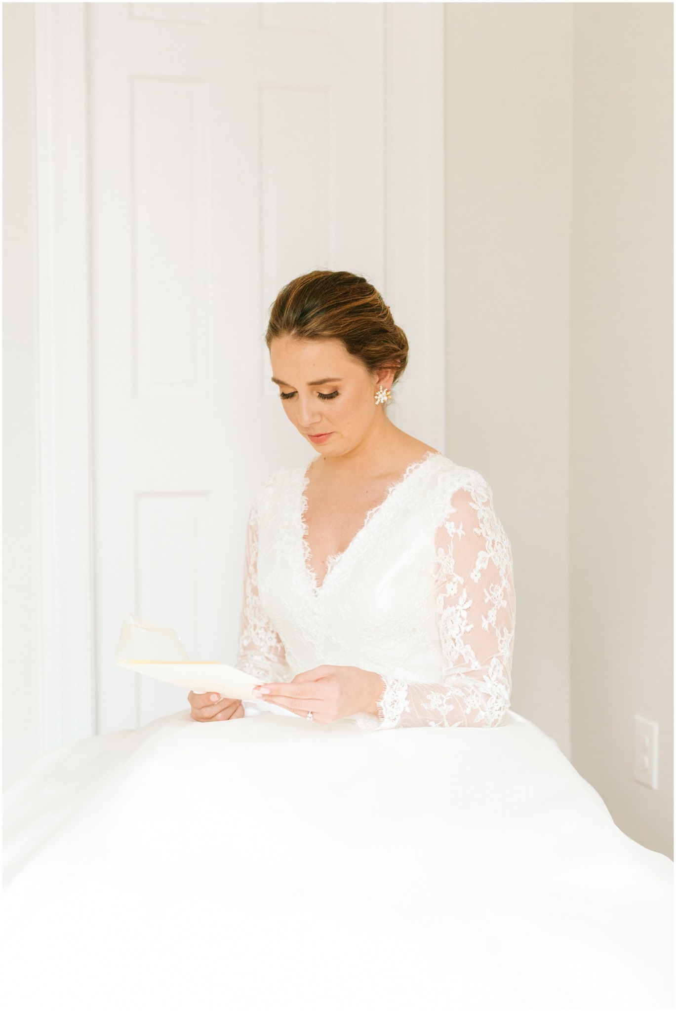bride reads letter from groom on wedding day in NC photographed by Chelsea Renay Photography