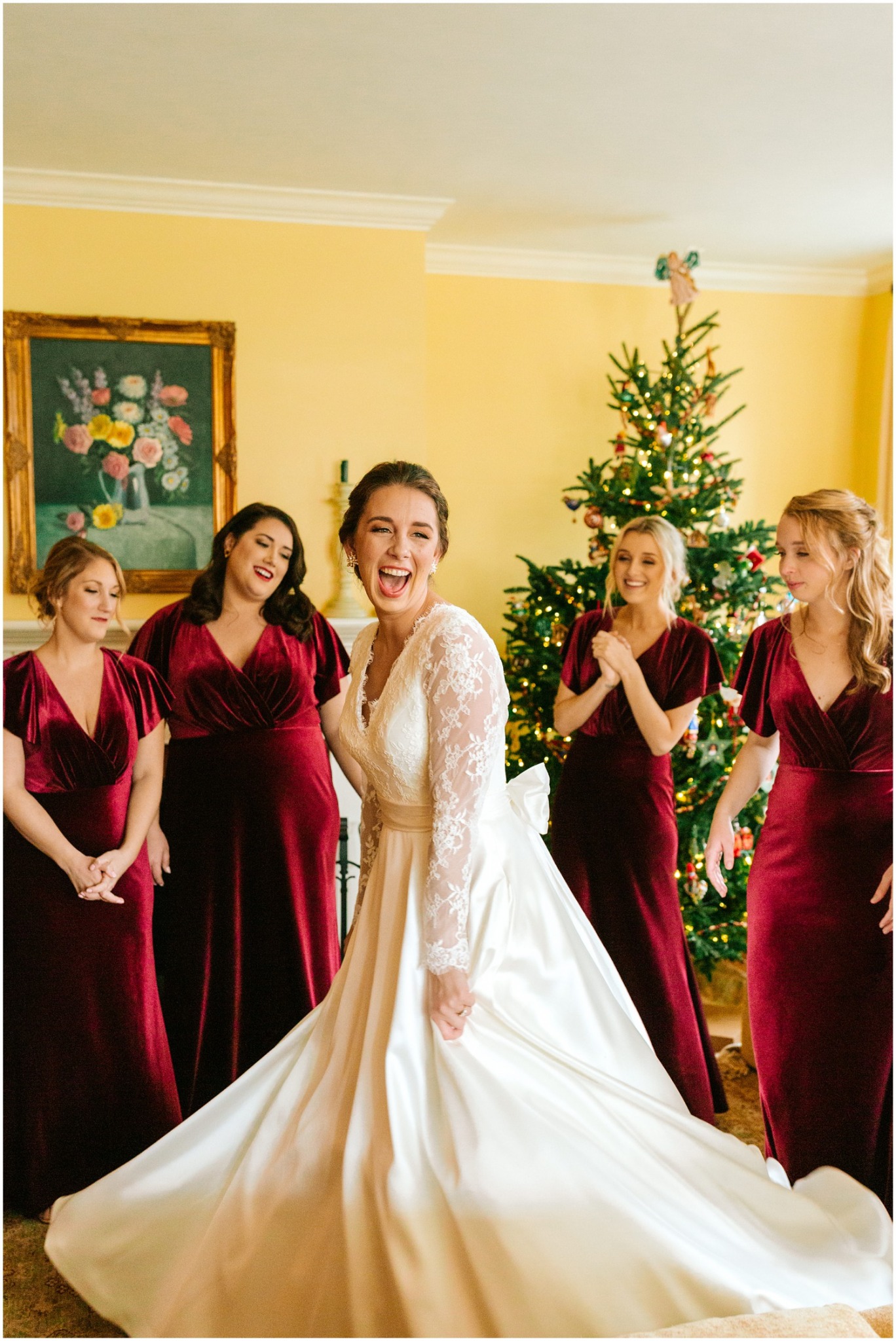 bridesmaids watch bride twirl her winter wedding gown photographed by Chelsea Renay Photography