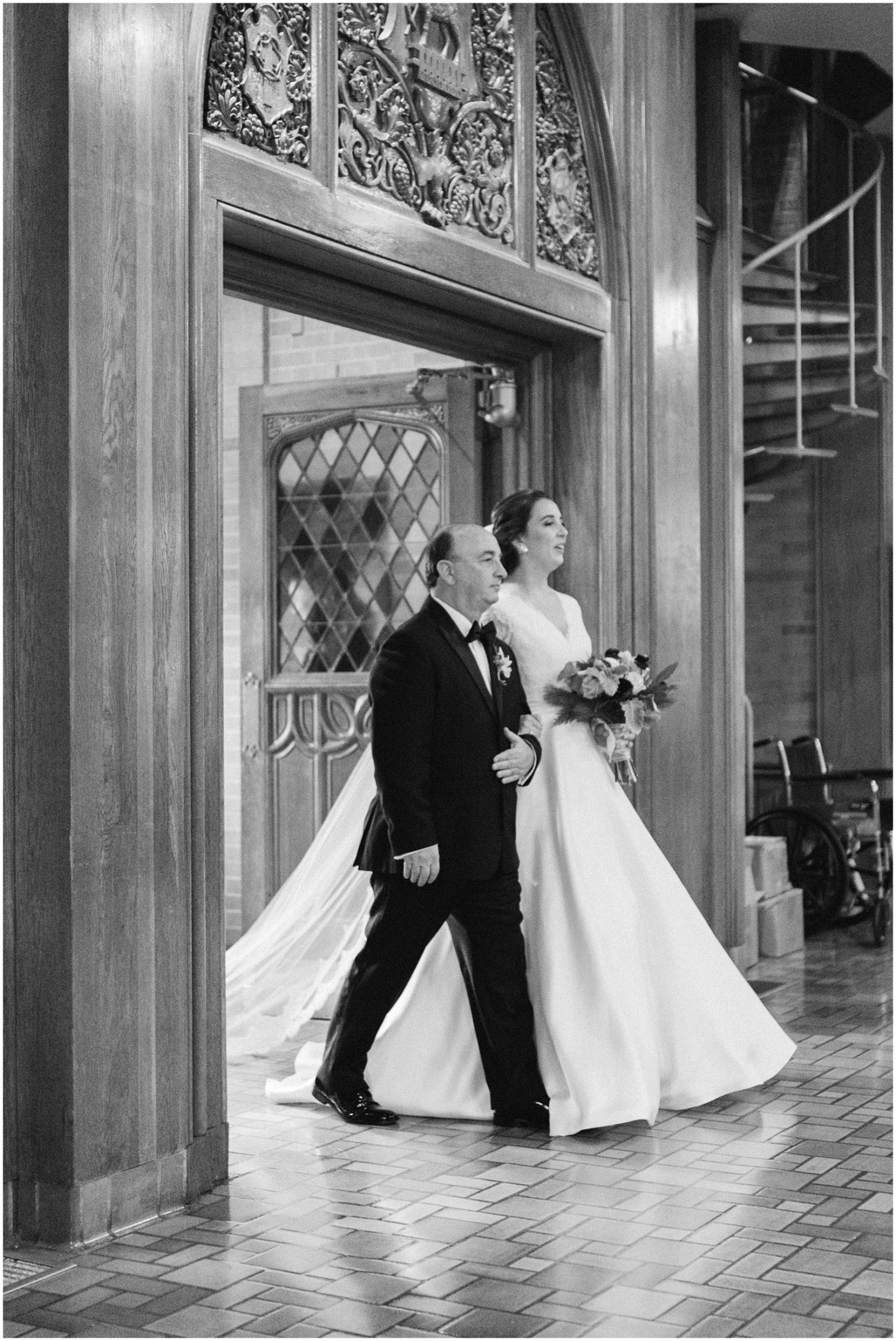 bride and father walk into church for wedding ceremony photographed by Chelsea Renay Photography
