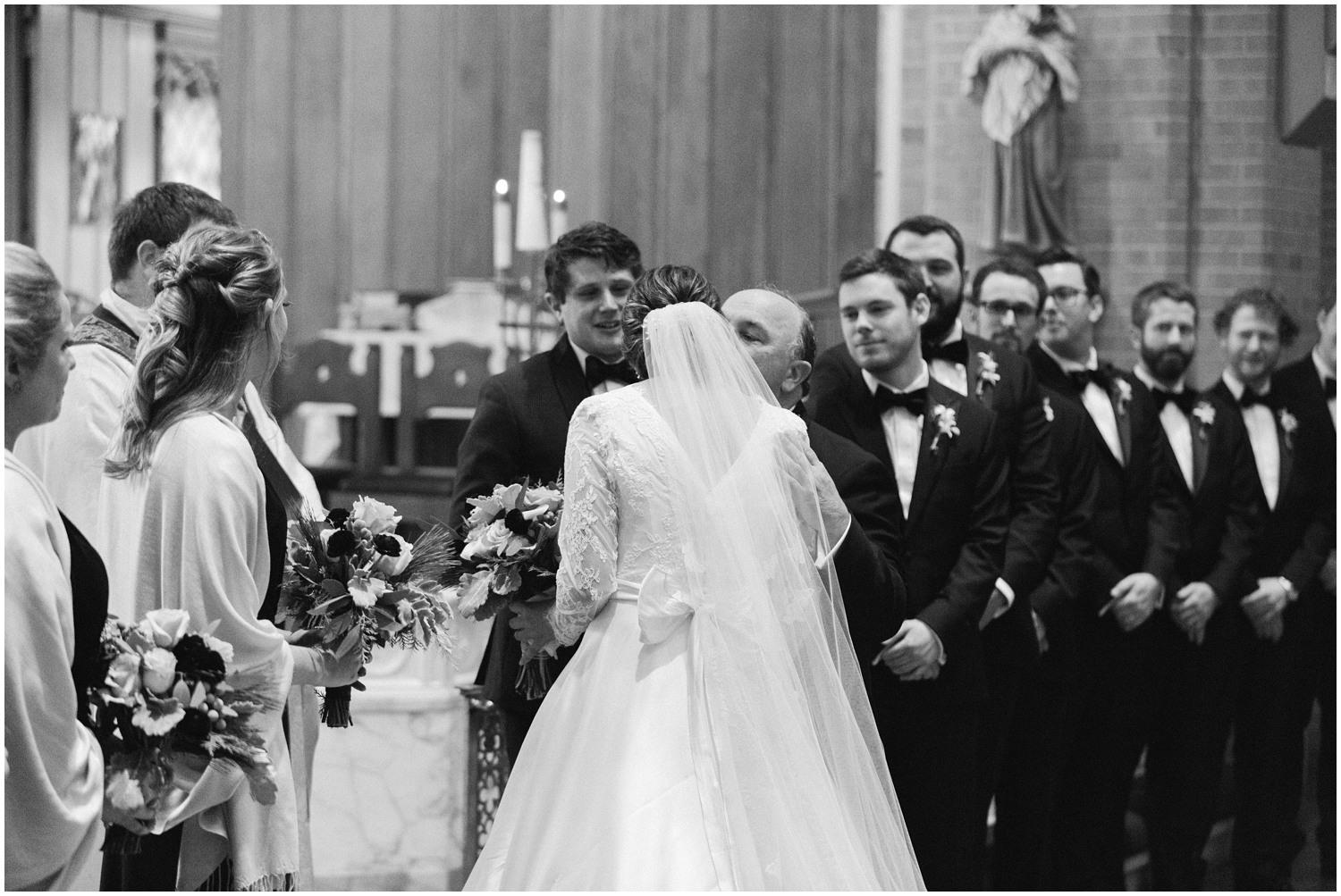 father gives away bride in traditional church wedding in North Carolina photographed by Chelsea Renay Photography