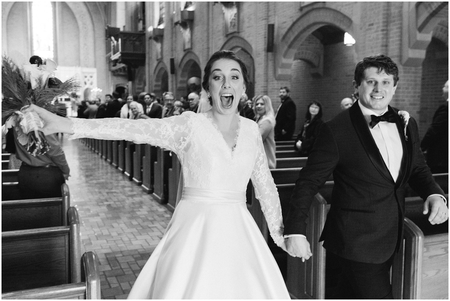bride and groom celebrate after traditional church wedding in North Carolina photographed by Chelsea Renay Photography