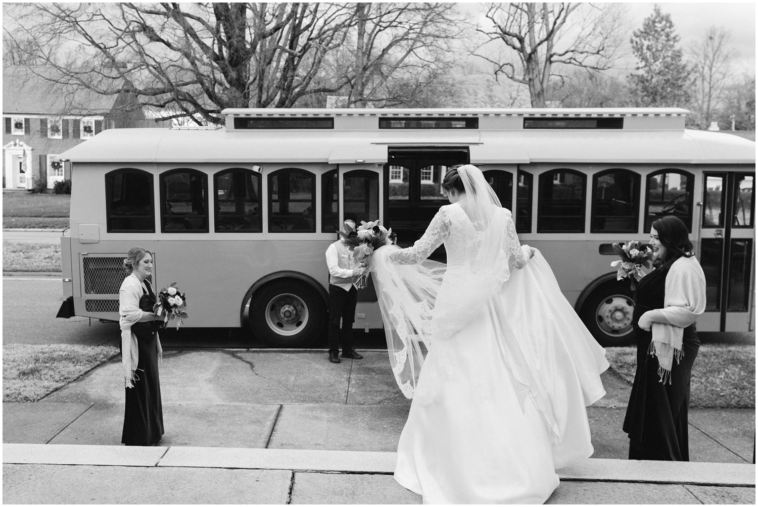 bride walks towards Greensboro NC trolley photographed by Chelsea Renay Photography