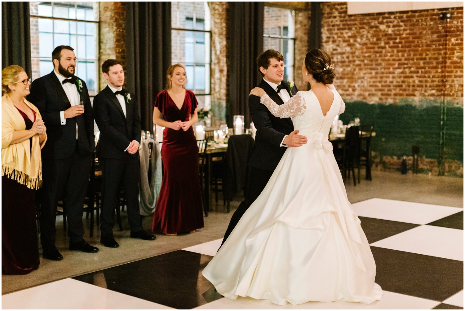 bride and groom's first dance at the Cadillac Service Garage in Greensboro NC 