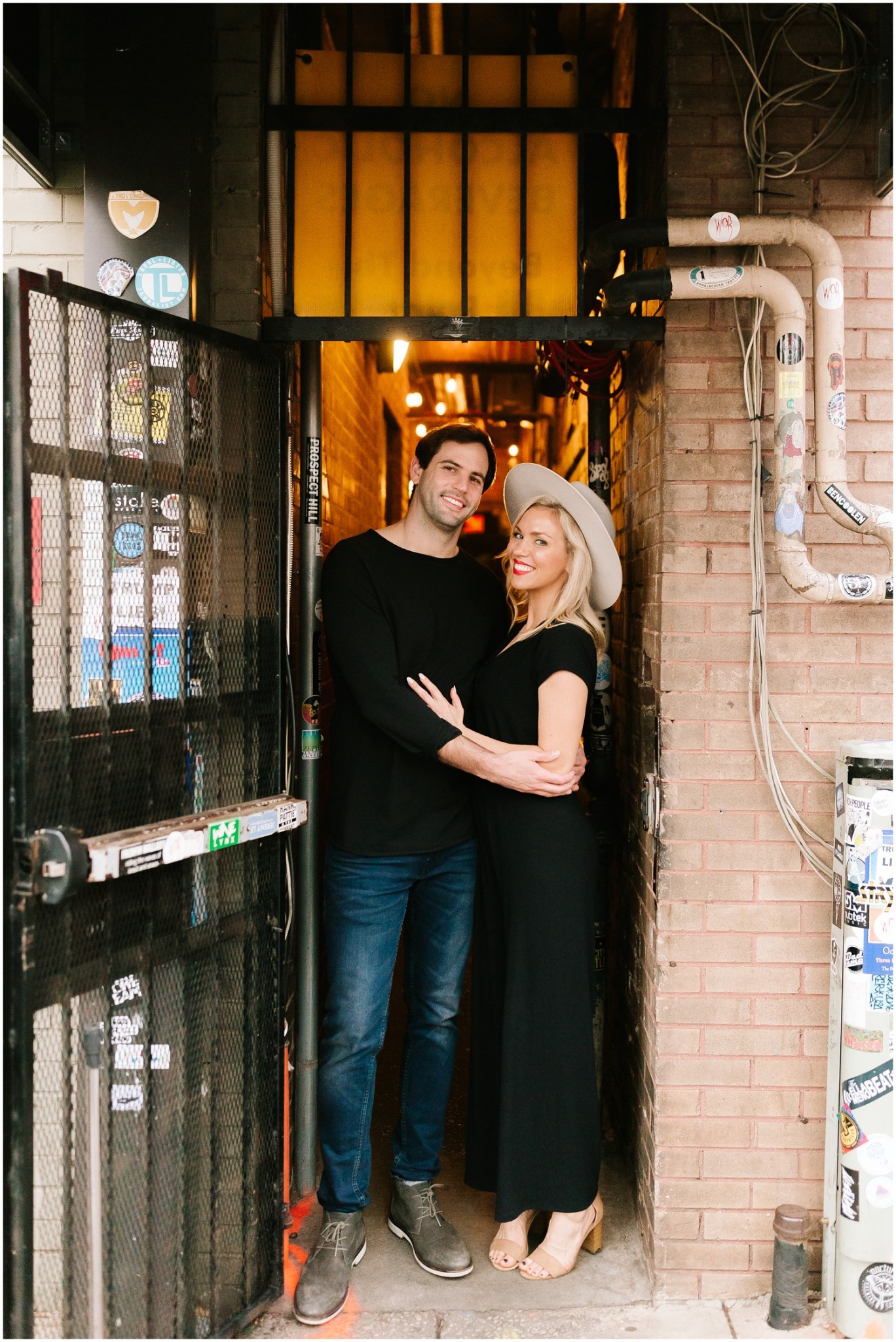 Downtown Raleigh Engagement Session with bride wearing wide brimmed hat