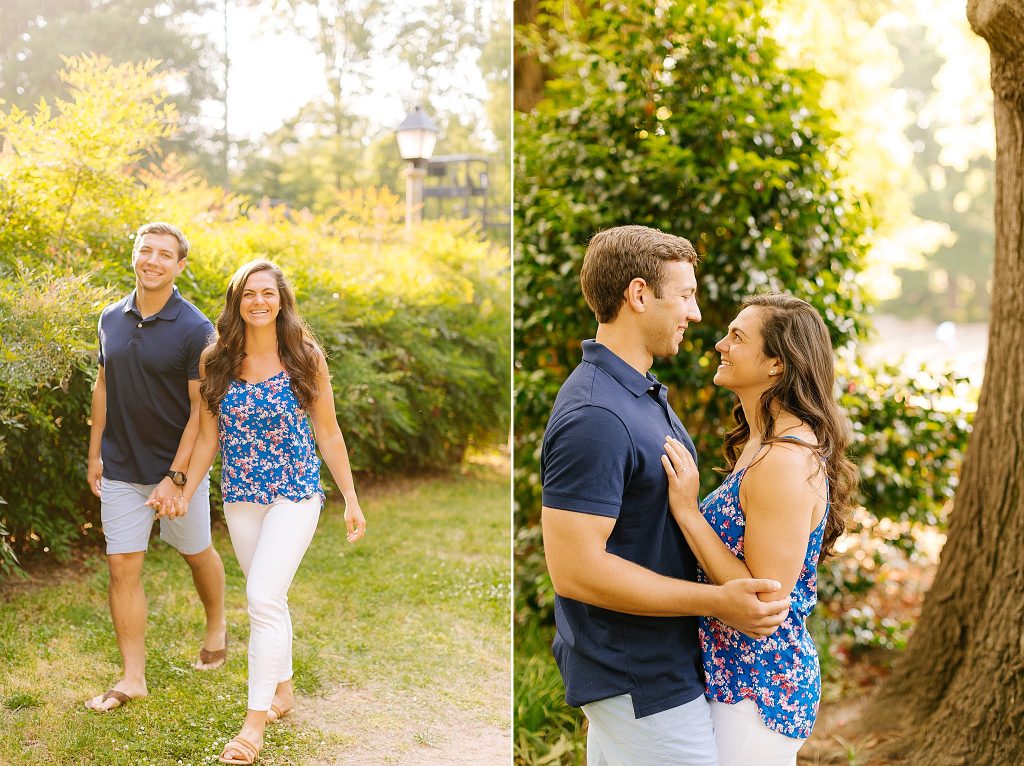 couple in blue shirts and light colored pants walks through Raleigh Rose Garden