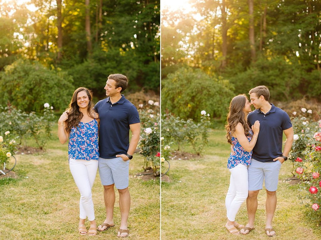 bride and groom to-be pose with white and pink roses in Raleigh NC