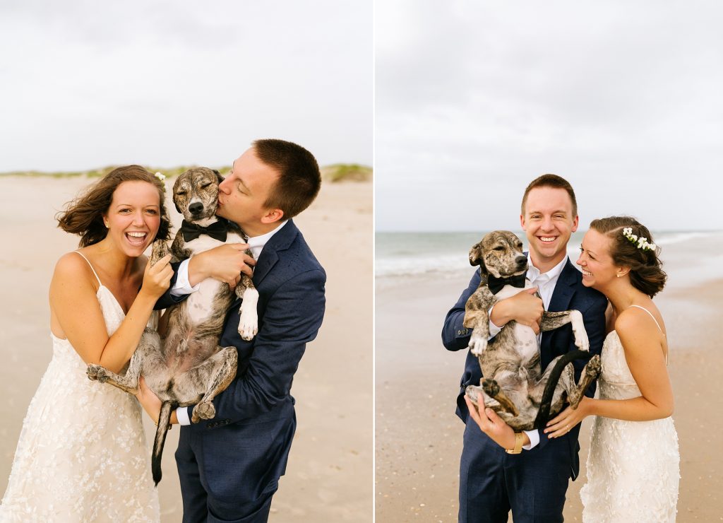 dog parents hold dog on wedding day