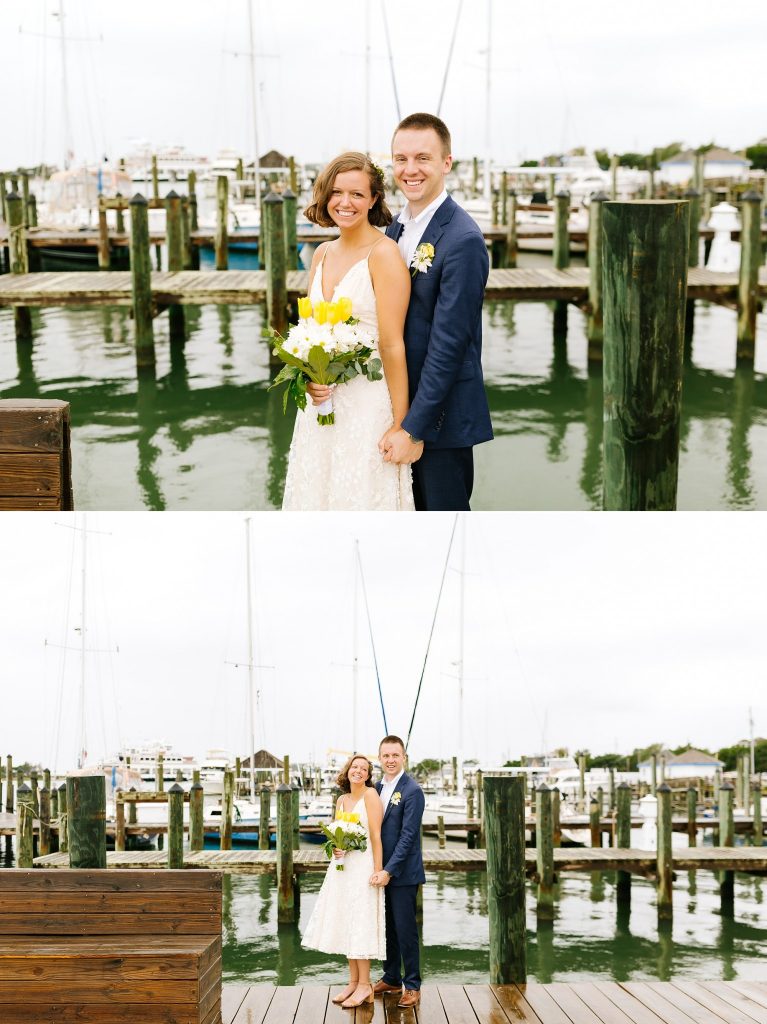 bride and groom pose on dock in Ocracoke 