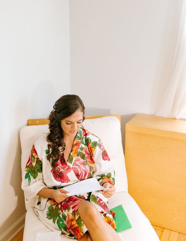 bride prepares for summer wedding day in NJ reading groom's letter