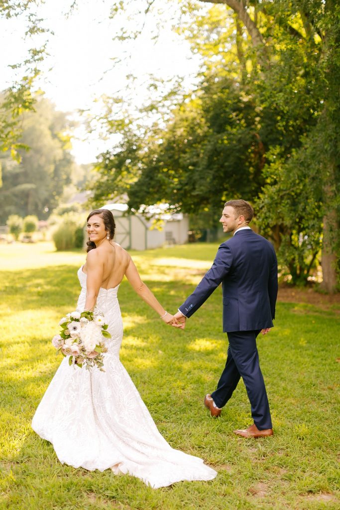 groom smiles at bride during NJ wedding