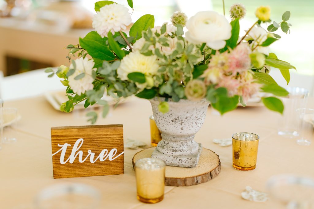 rustic wedding centerpieces on piece of wood