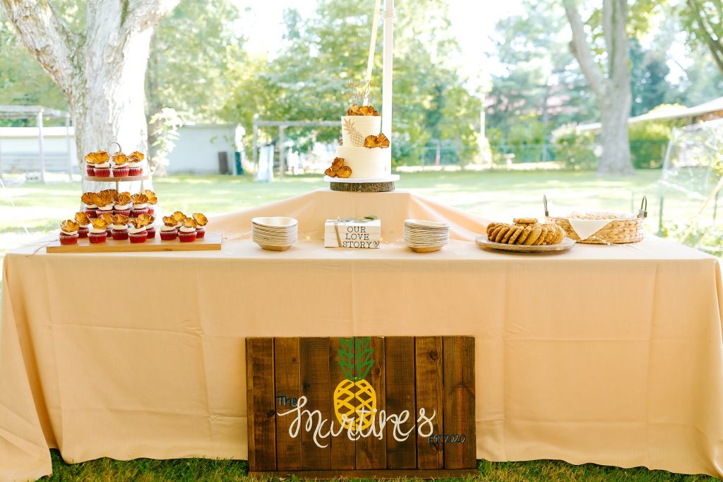 dessert table with pineapple inspired desserts