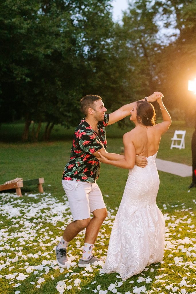 groom twirls bride after New Jersey wedding