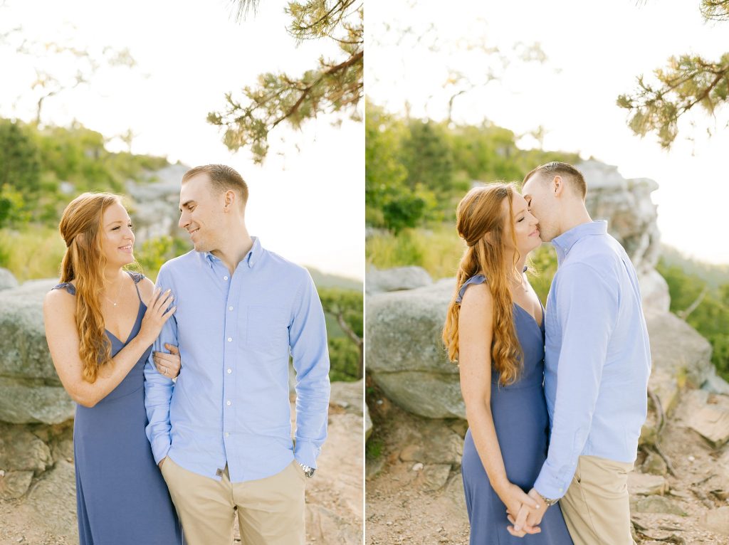 couple in blue outfits pose for Chelsea Renay on Pilot Mountain