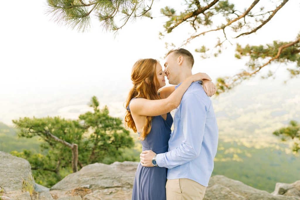 engagement portraits on top of Pilot Mountain