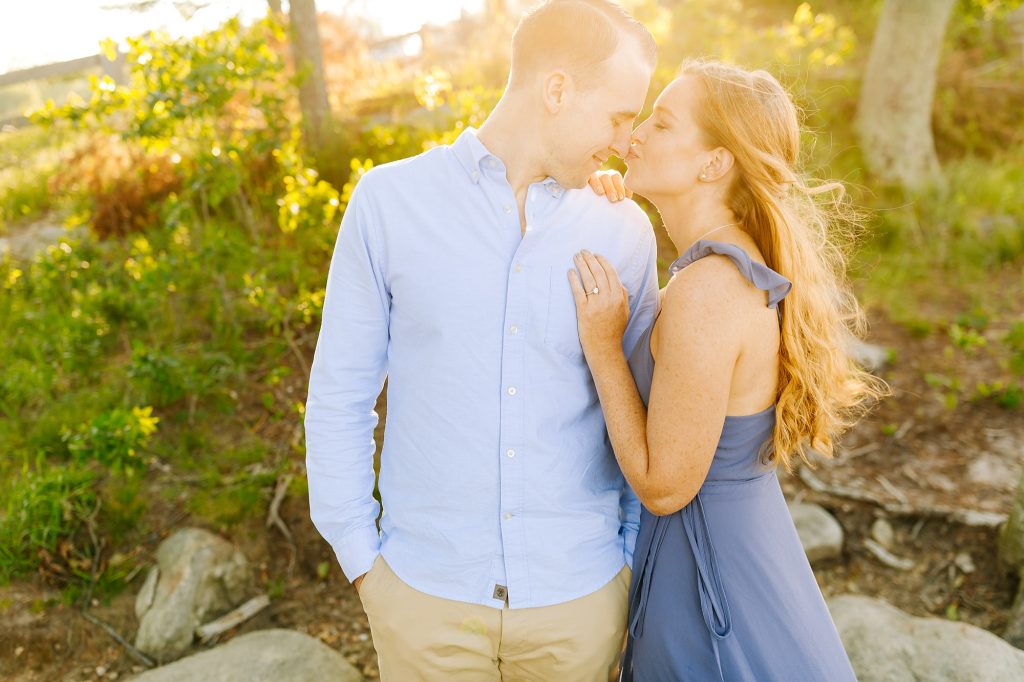 engagement session on mountainside with bride in blue sundress