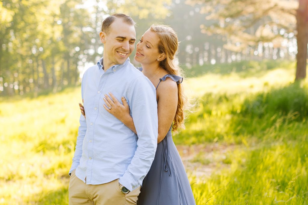 Chelsea Renay photographs North Carolina couple in blue dress and blue button down shirt